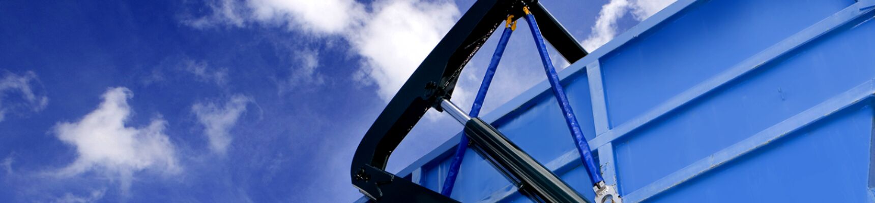 Large blue skip for waste