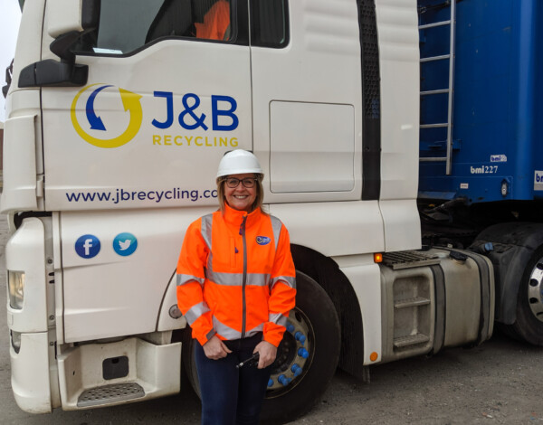 Clare Bradley stood next to J&B recycling truck
