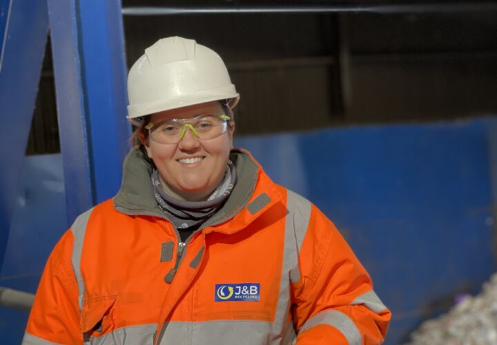Photo of female operations manager at J&B Recycling wearing PPE and a hard hat